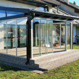 Skleněná veranda: možnosti pro zasklení rozšíření v soukromém domě