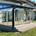 Skleněná veranda: možnosti pro zasklení rozšíření v soukromém domě